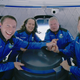 Glen de Vries, Audrey Powers, William Shatner, and Chris Boshuizen during their flight to space aboard a Blue Origin rocket.